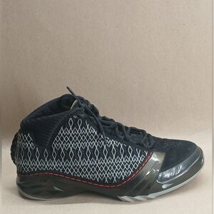 Air Jordan Black and Gray Athletic Shoes with Red Accents